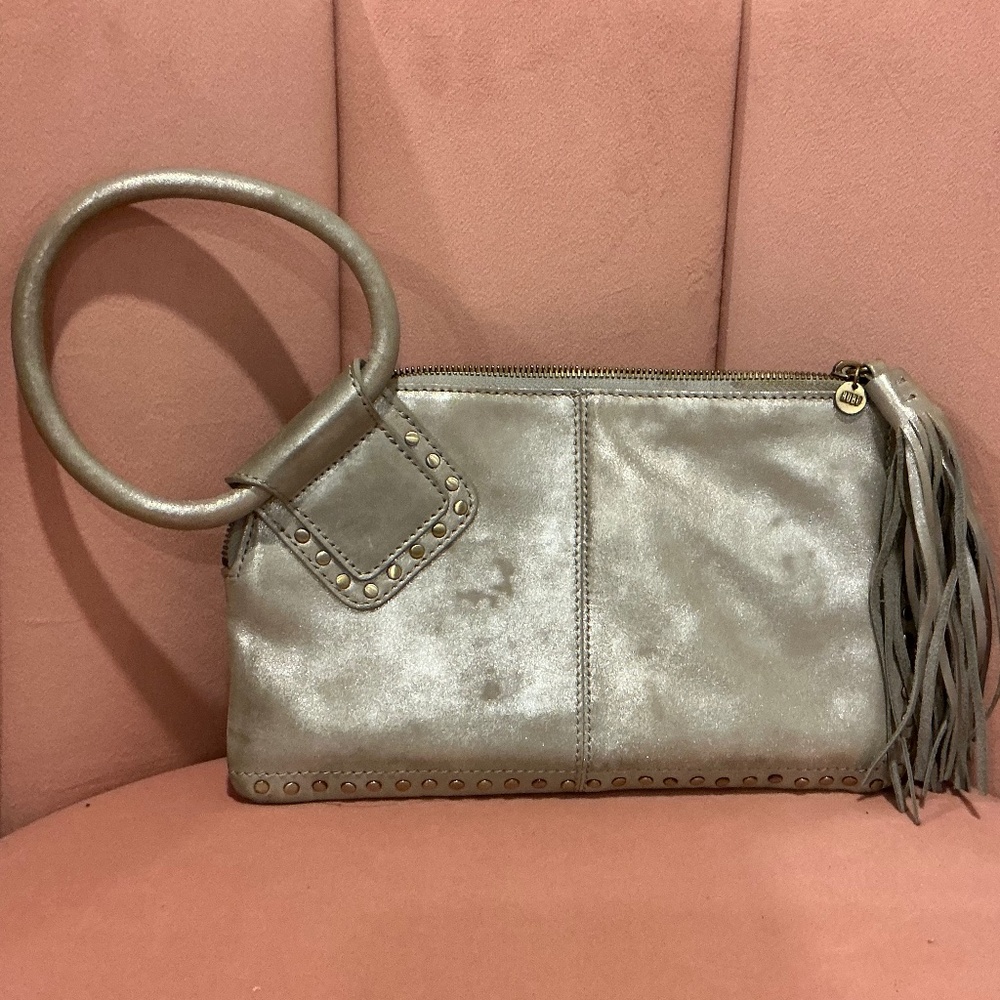 HOBO brand leather metallic wristlet bag with fringe